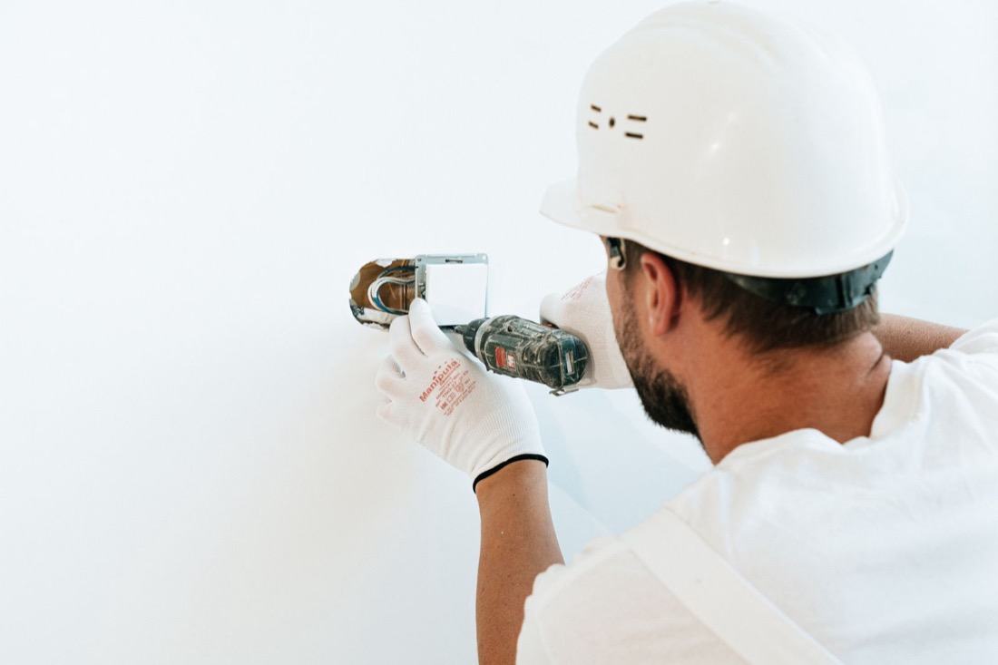 Installing a wall outlet with a cordless driver